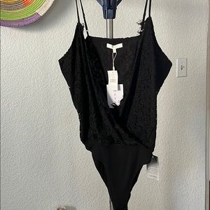 Black lace bodysuit with snap closure